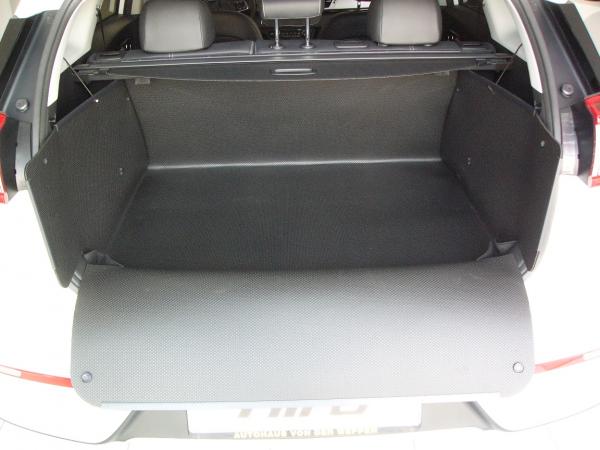 Kofferraumschutz für Kia Niro wie eine Ummantelung des Kofferraums gegen Schmutz und Feuchtigkeit.